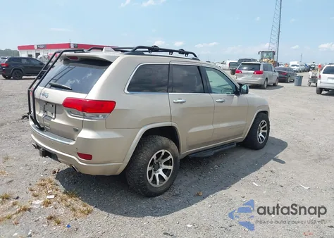 2014 Jeep Grand Cherokee Overland из США, поврежденный, VIN 1C4RJFCM2EC305785